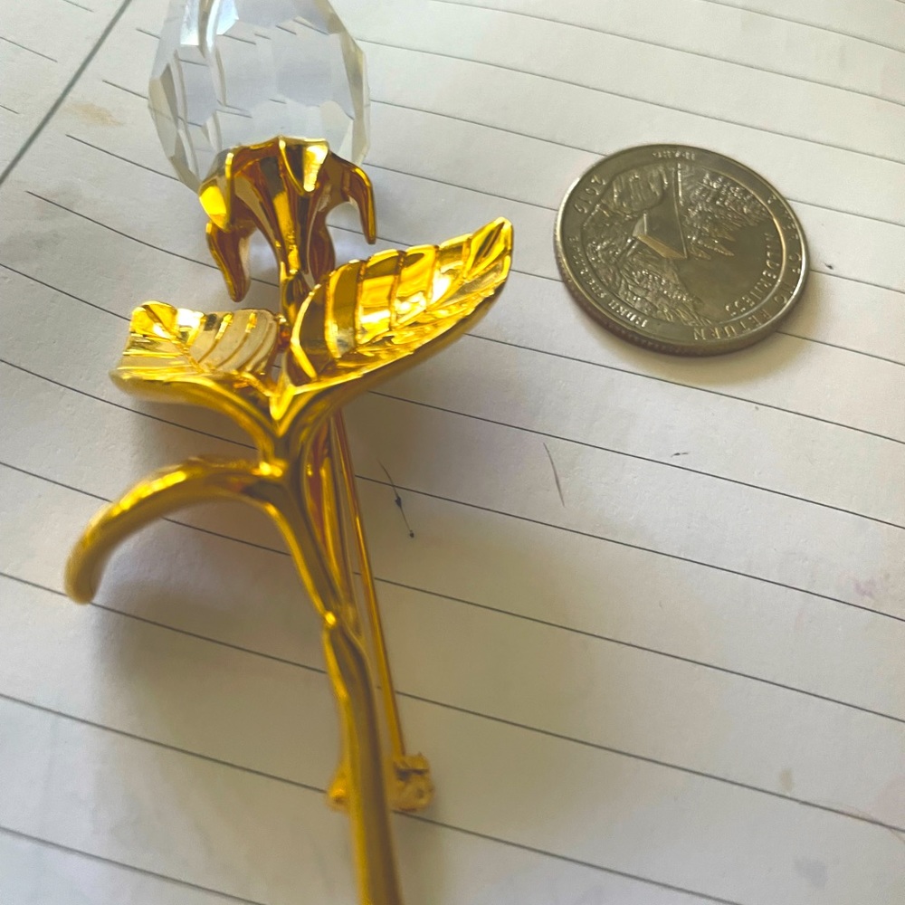 Crystal and gold tone brooch